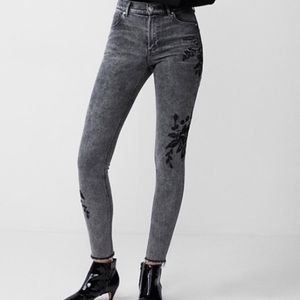 Express High Waisted Acid Wash Raw Hem Ankle Jeans with Floral Appliqués